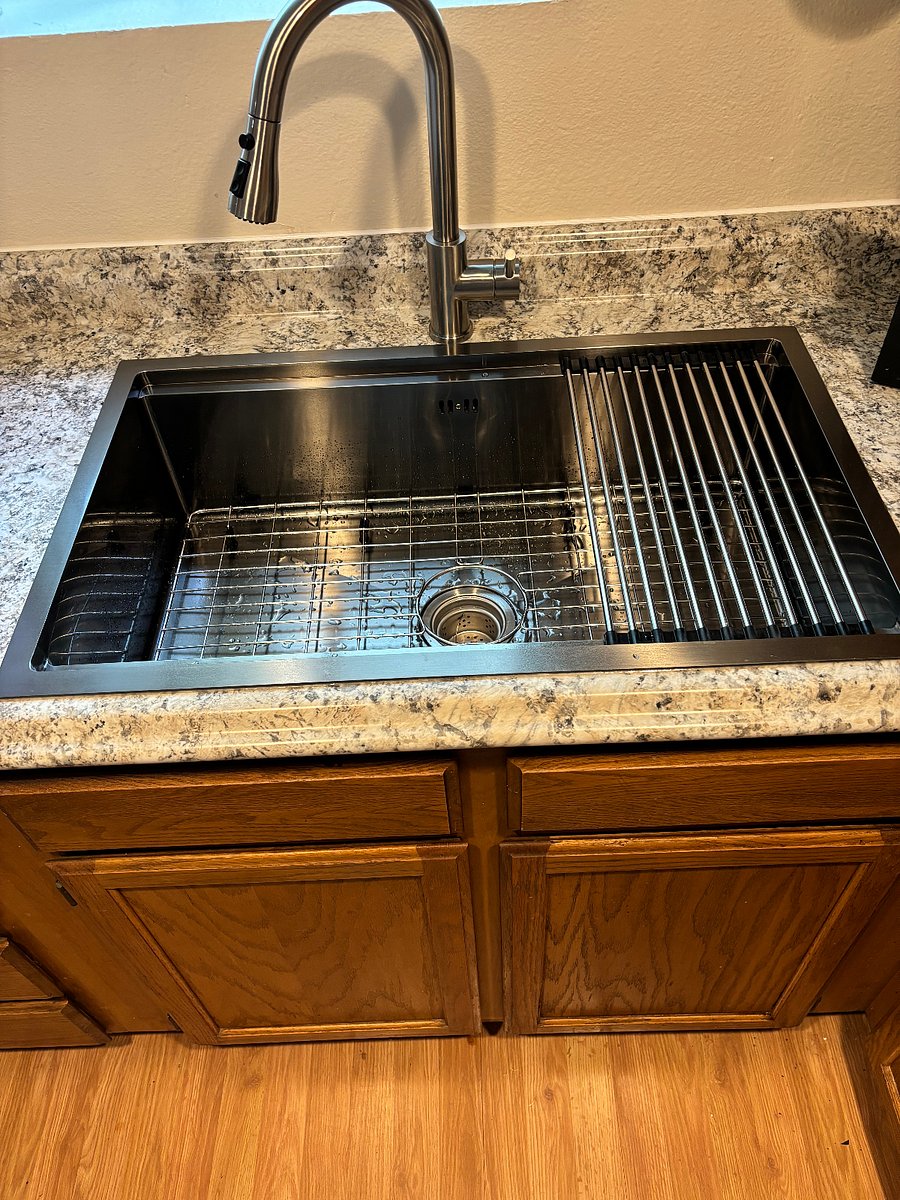 New sink with draining rack (cutting board, and colander not shown).