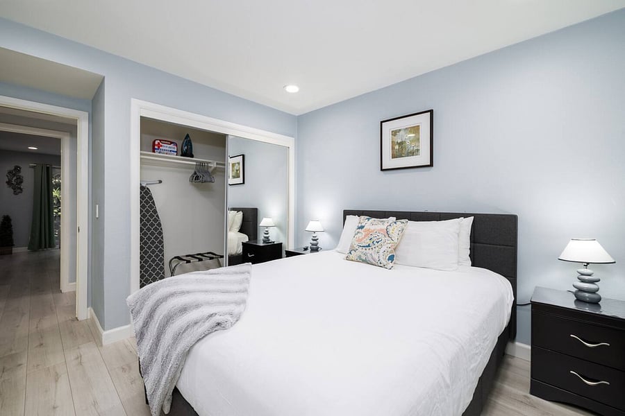 Queen bed & smart TV in bedroom #4