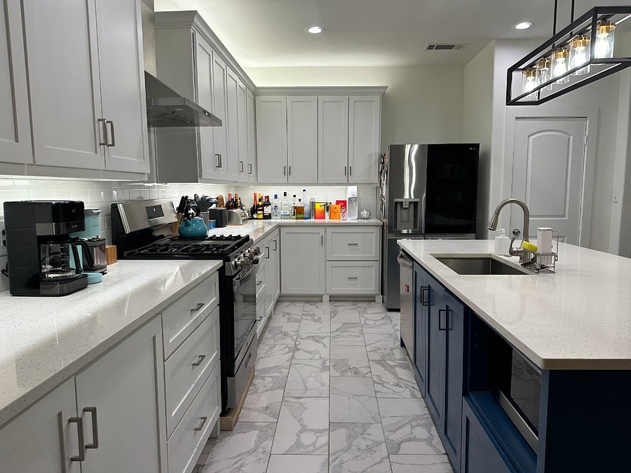 This massive, beautiful kitchen is my favorite part of the house, and it'll probably be yours too. Gas range, huge kitchen island. Let's cook.