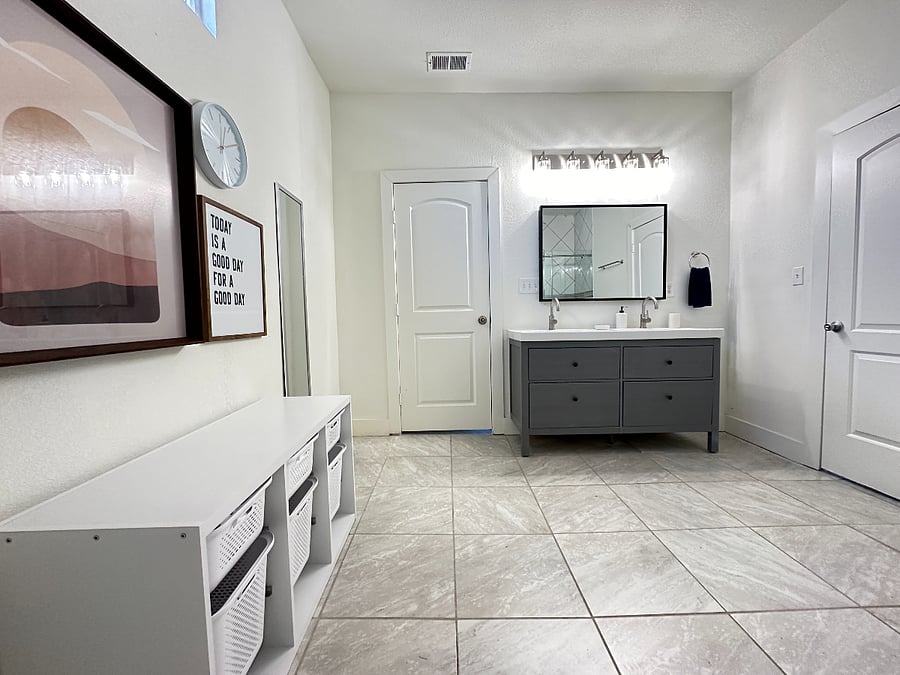 Downstairs shared bathroom bathroom has plenty of storage space for you.