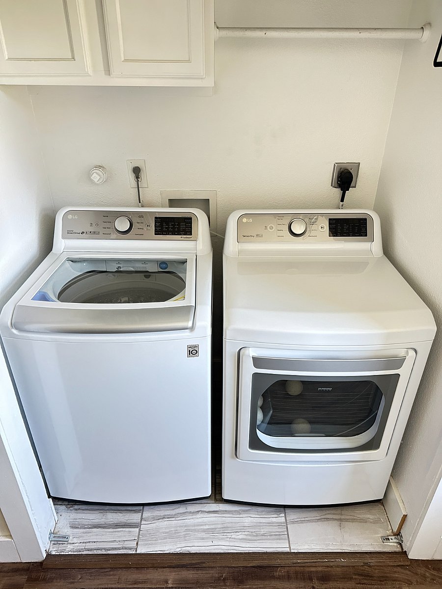 High capacity washer and dryer in the house.