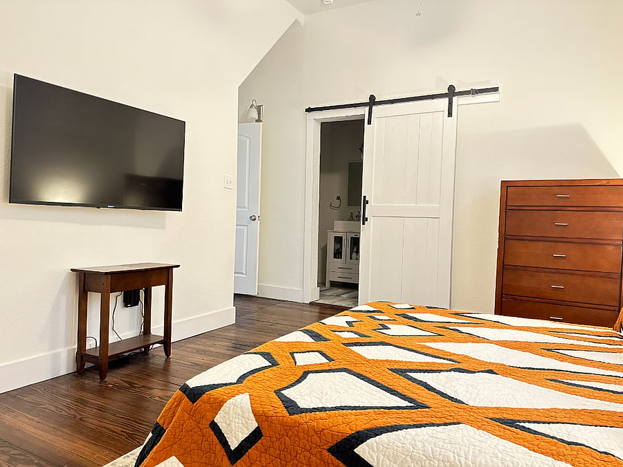 Large downstairs bedroom with King size bed.