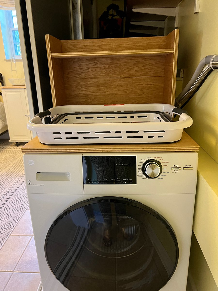 Small All in one Washer/Dryer behind sliding mirror doors