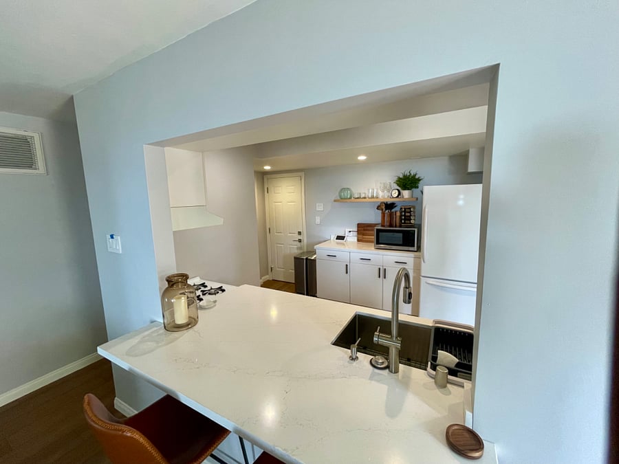 Newly remodeled kitchen with all the fixins! Enjoy the gas range, dishwasher, walk-in pantry, full size refrigerator, and more! All dishware, cutlery, and bakeware is included.