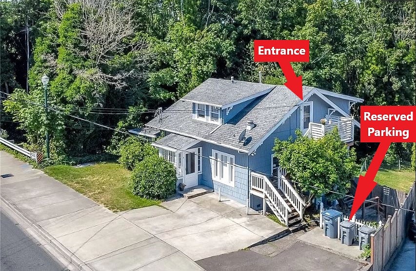 Aerial drone view of the house. Wooded greenbelt is the nearest neighbor.