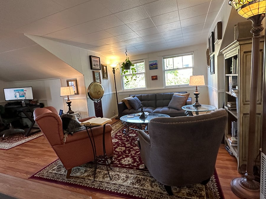 Living Room. Computer desk is set up to the left.