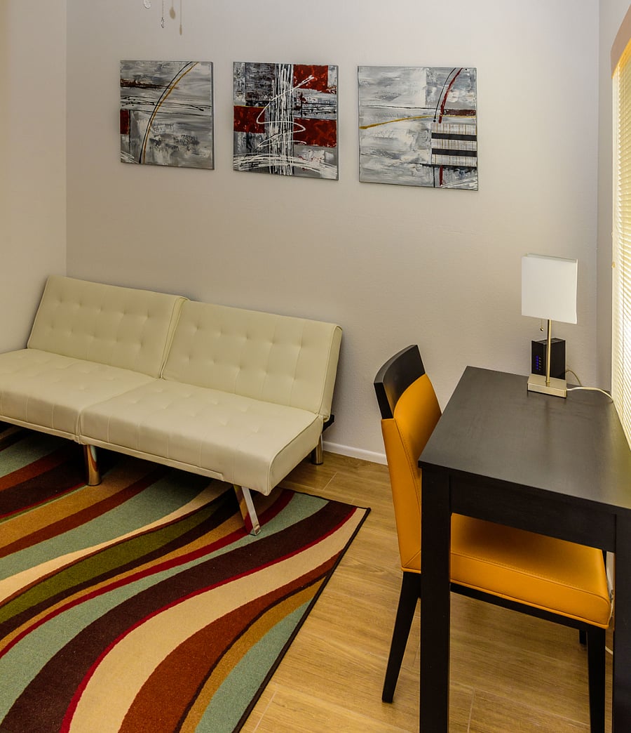 Office room with desk and futon