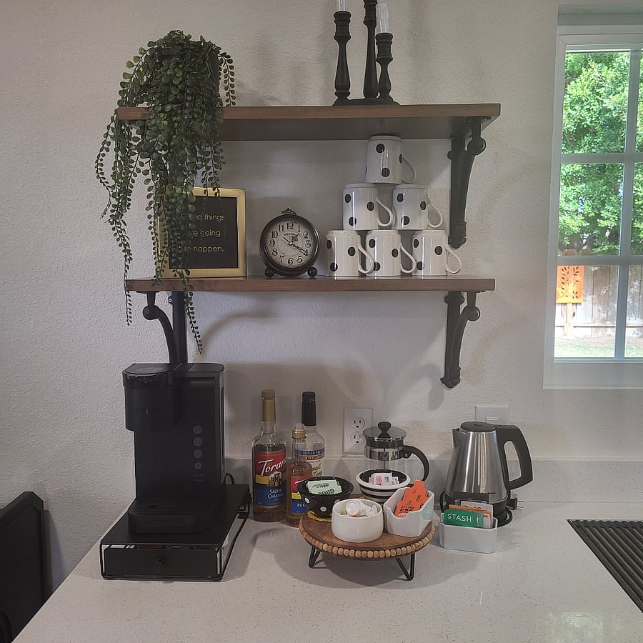 Coffee station. Keurig coffee maker, French press, and hot water kettle. Notice the cute Kate Spade cups.