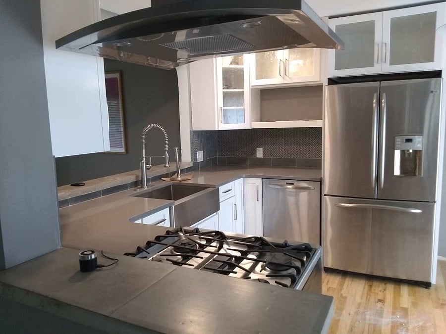 Main floor kitchen with full size refrigerator, stove, oven, microwave and dishwasher