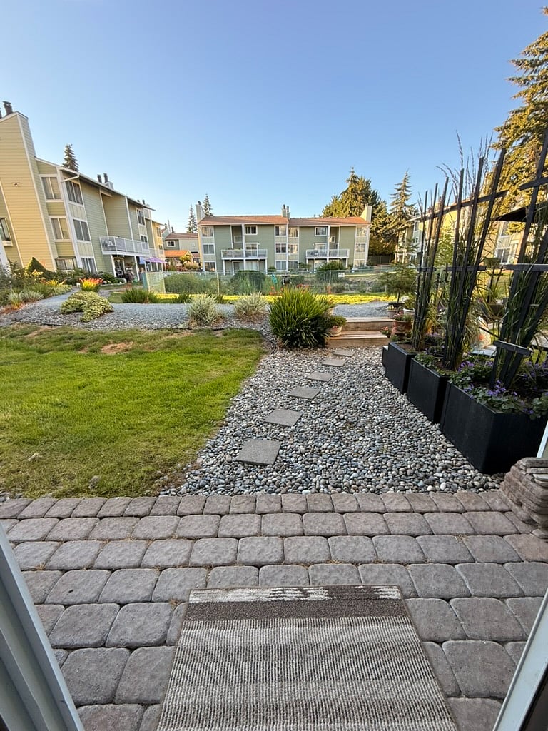 View of the backyard and pond