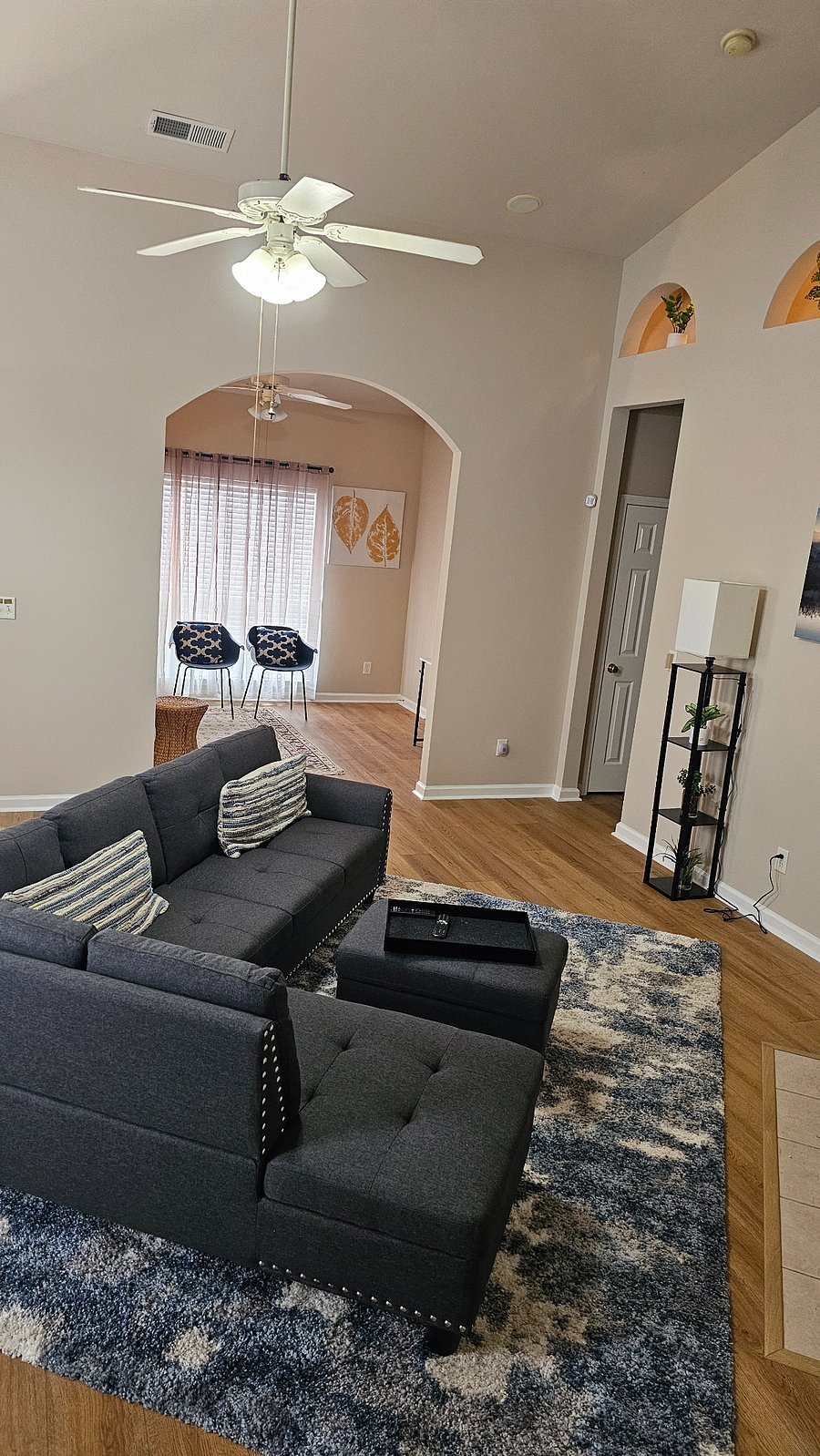 Living Room Sectional Sofa. Den/Office in background
