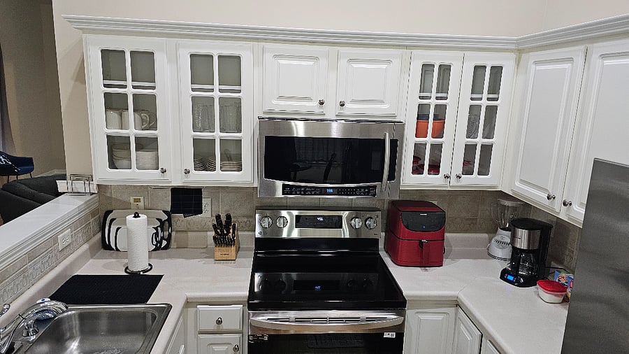 Kitchen with new Stainless Steel appliances, coffee maker, air fryer and blender