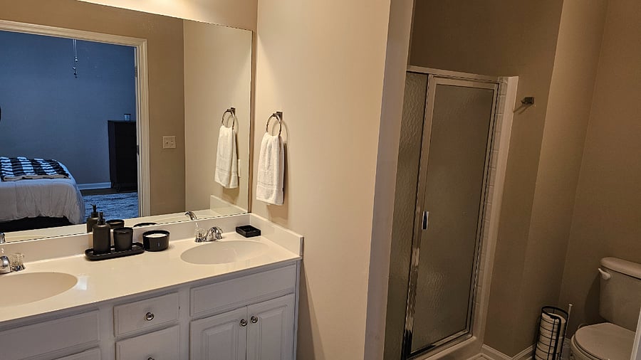 Double sinks in Master Bathroom and stand in shower
