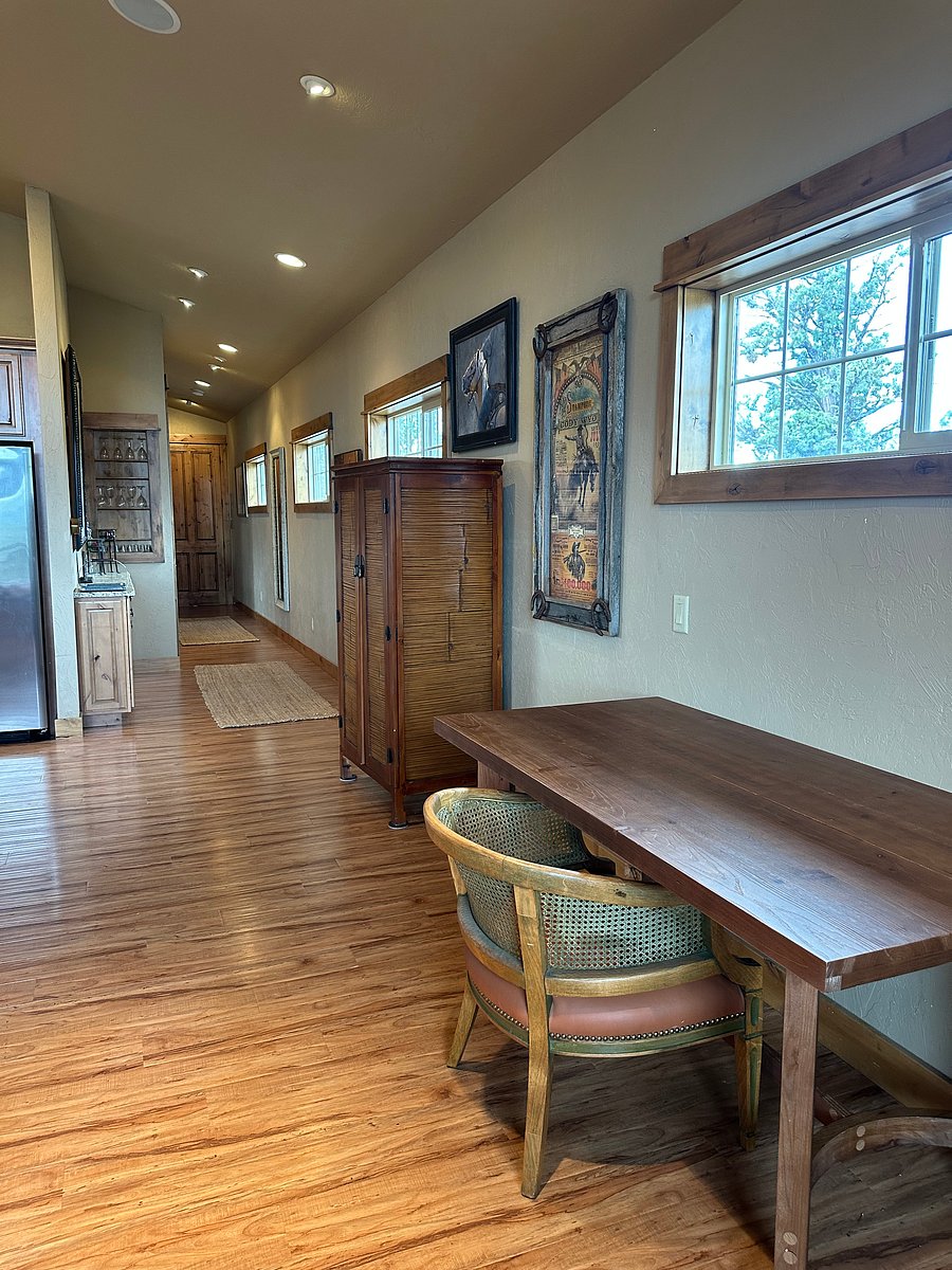 Hallway and bar area with the back door to the apartment that is accessed from the inside of the Miracle barn
