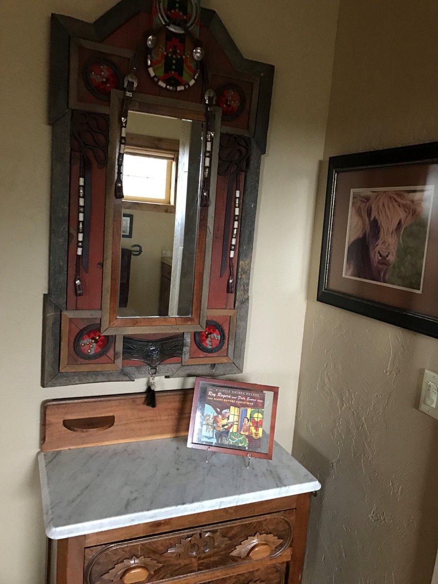 Antiques and artwork throughout the apartment