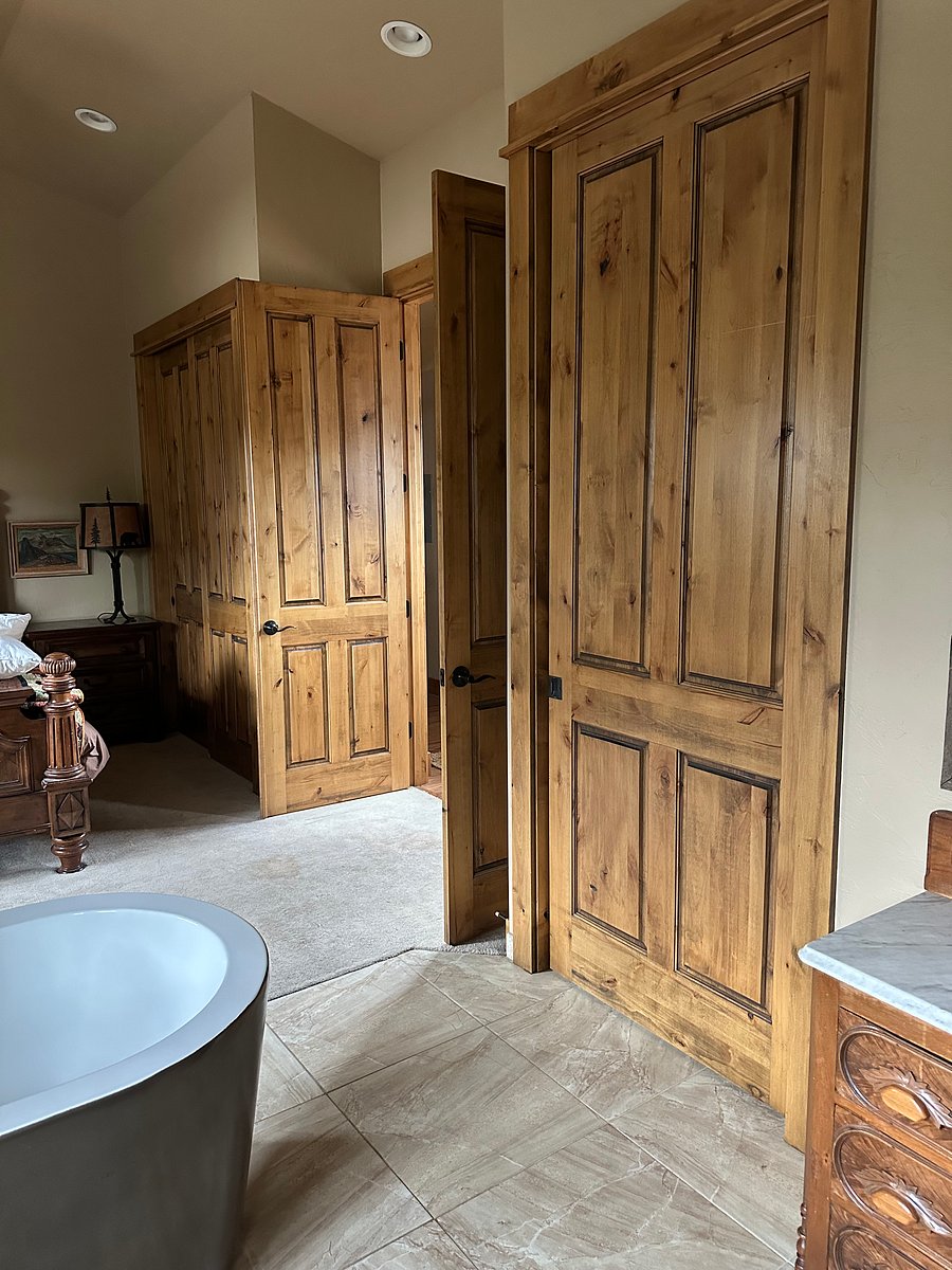 All doors are 10 feet tall with very high ceilings that are vaulted in every room and ceiling fans. All wood is made out of alder. There are two large closets in the bedroom and one in the hallway.