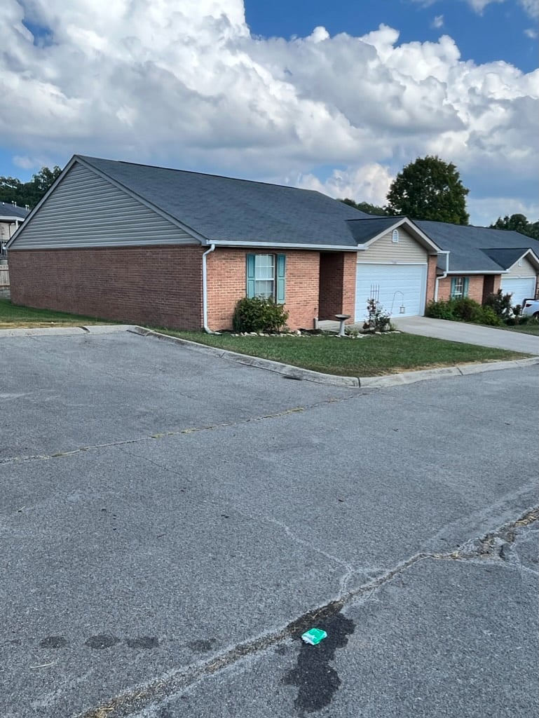 2 car attached garage with guest parking next to unit