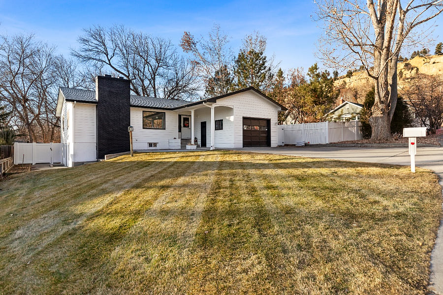 Front of house with large yard