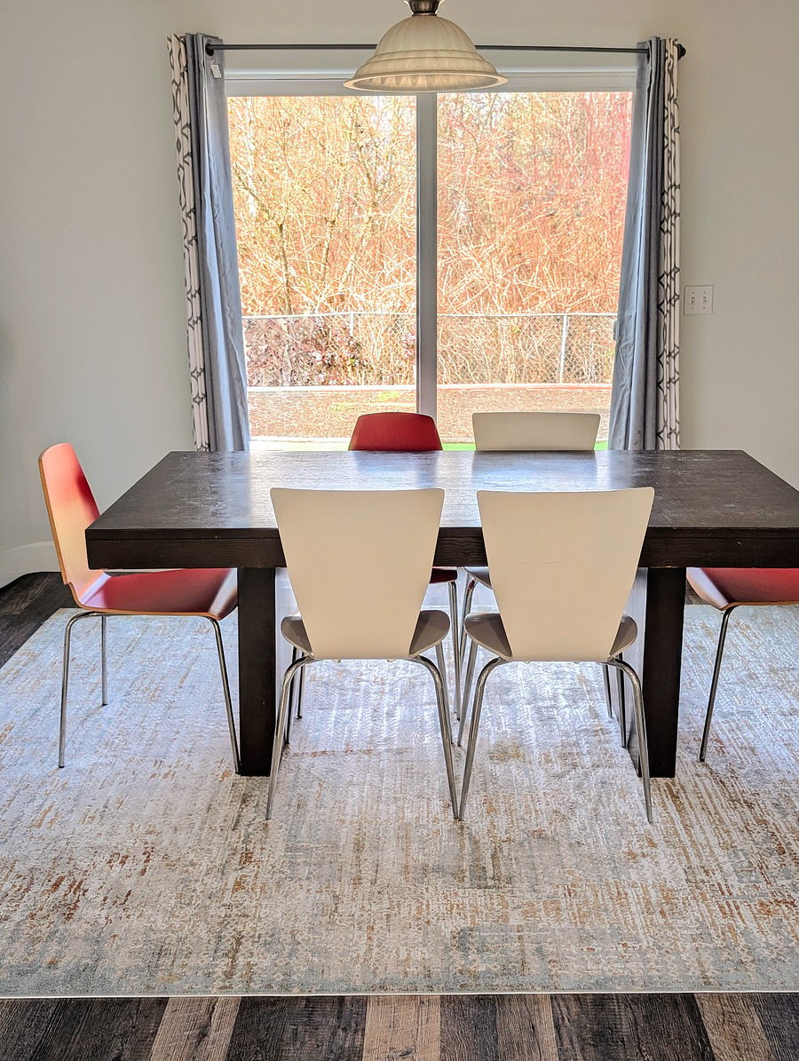 A bright and peaceful dining space with plenty of natural light. Perfect for enjoying a meal or catching up on work in a comfortable setting.