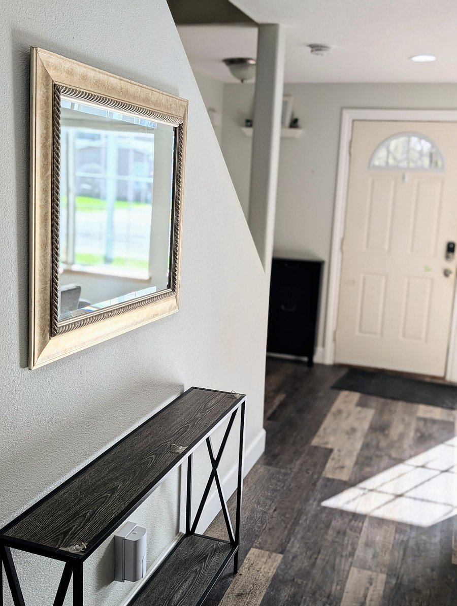 A bright and inviting entryway with a modern touchsimple, stylish, and functional.