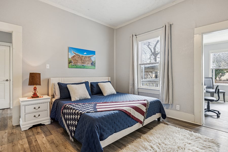 Primary suite w/ comfortable king bed.