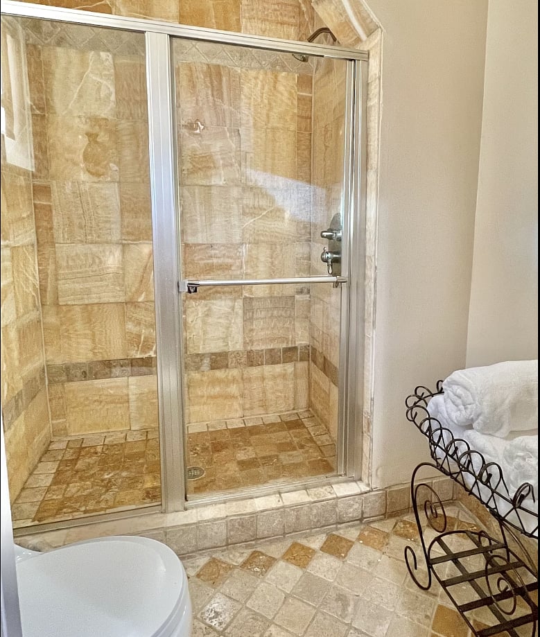 Beautiful full tile shower in Master bathroom