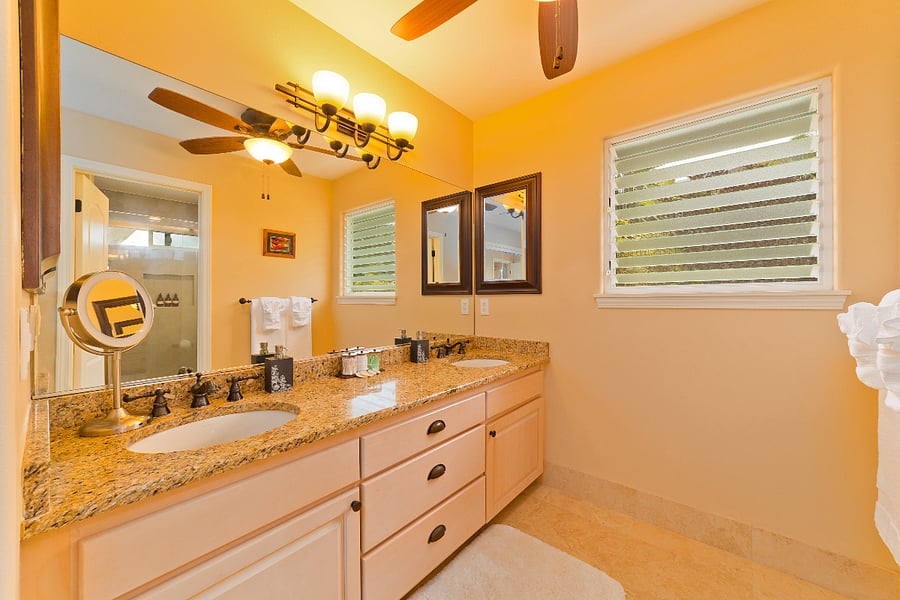 primary bathroom has double sinks with all basic amenities.
