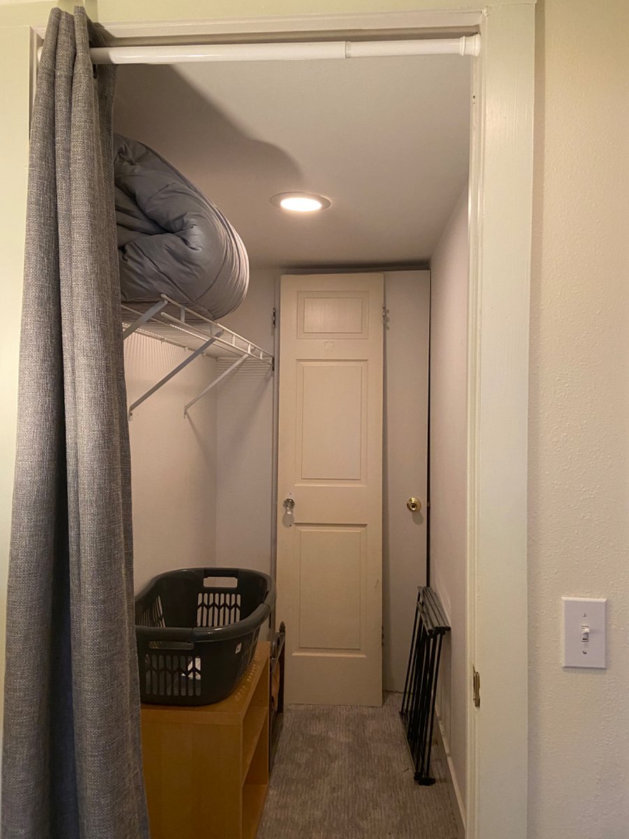 Very large closet. Includes hangars, laundry hamper, drying rack, etc.