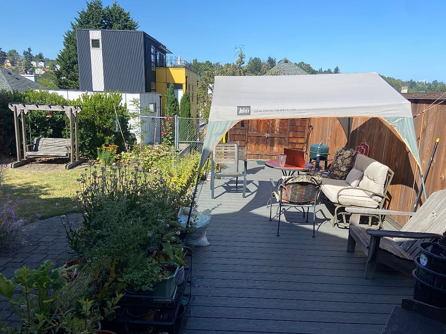 Summer view of the backyard from the apartment entrance and from kitchen windows