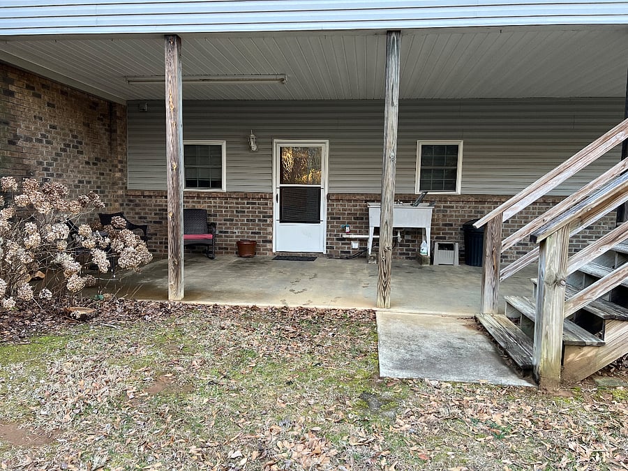 Studio apartment entry, Covered porch.