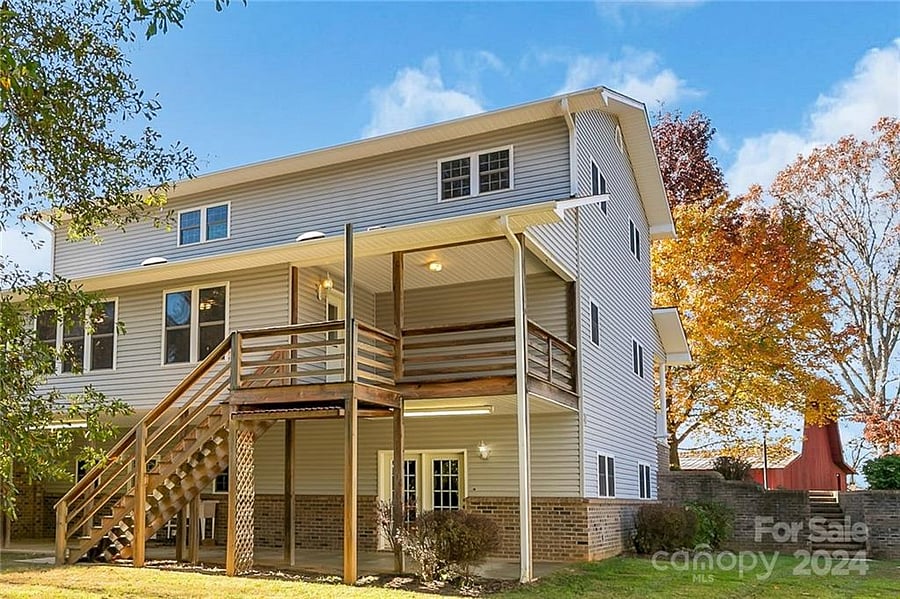 Back view of full Main home and apartment on bottom lower level.