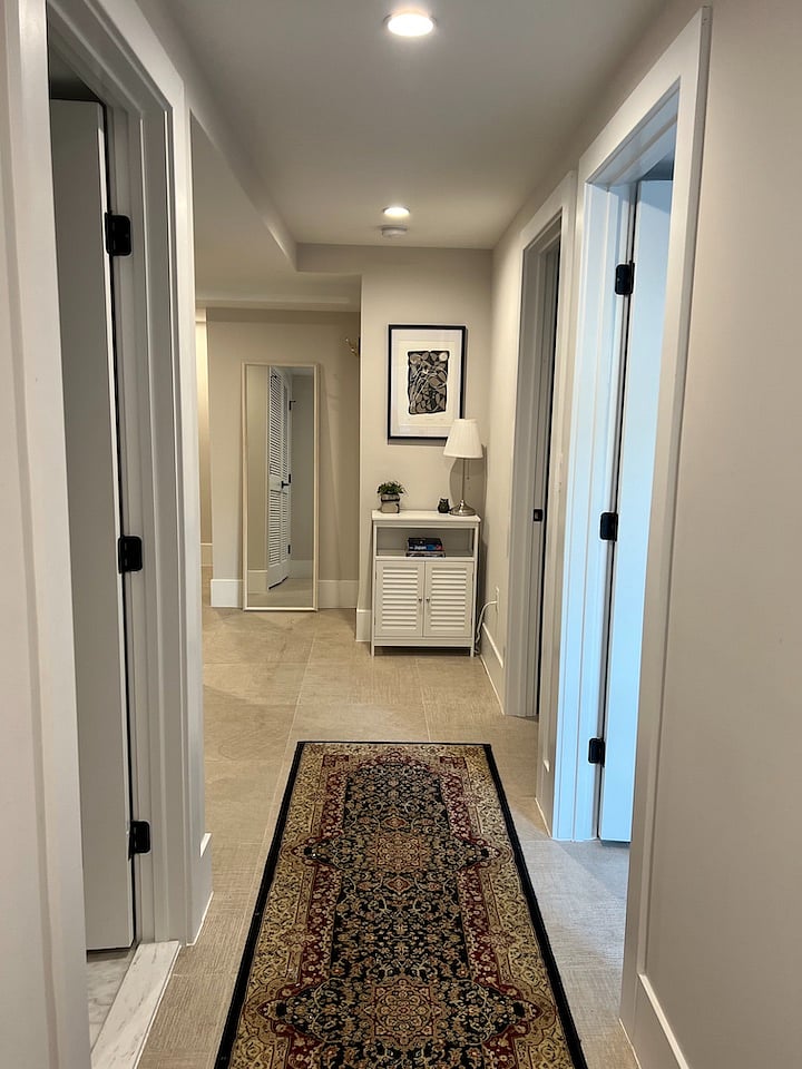 foyer / entry view from back entrance (bathroom is on the left, bedroom doors on the right