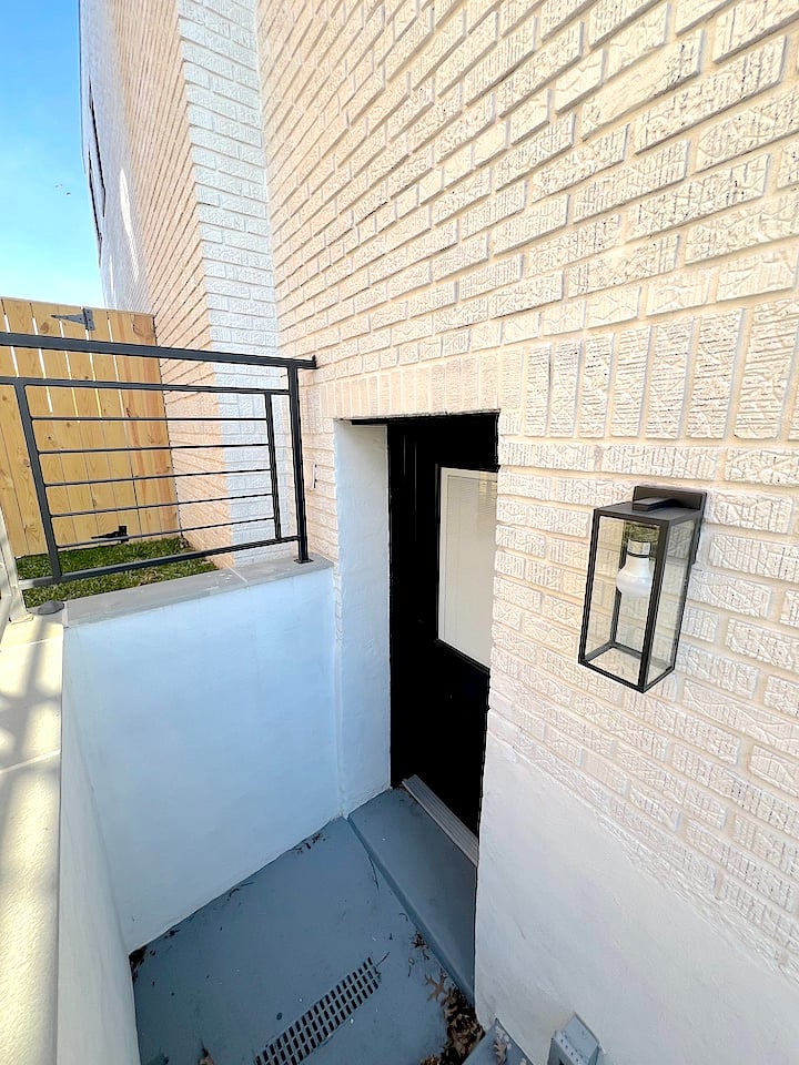 Front entrance to the apartment leading to the living room and kitchen