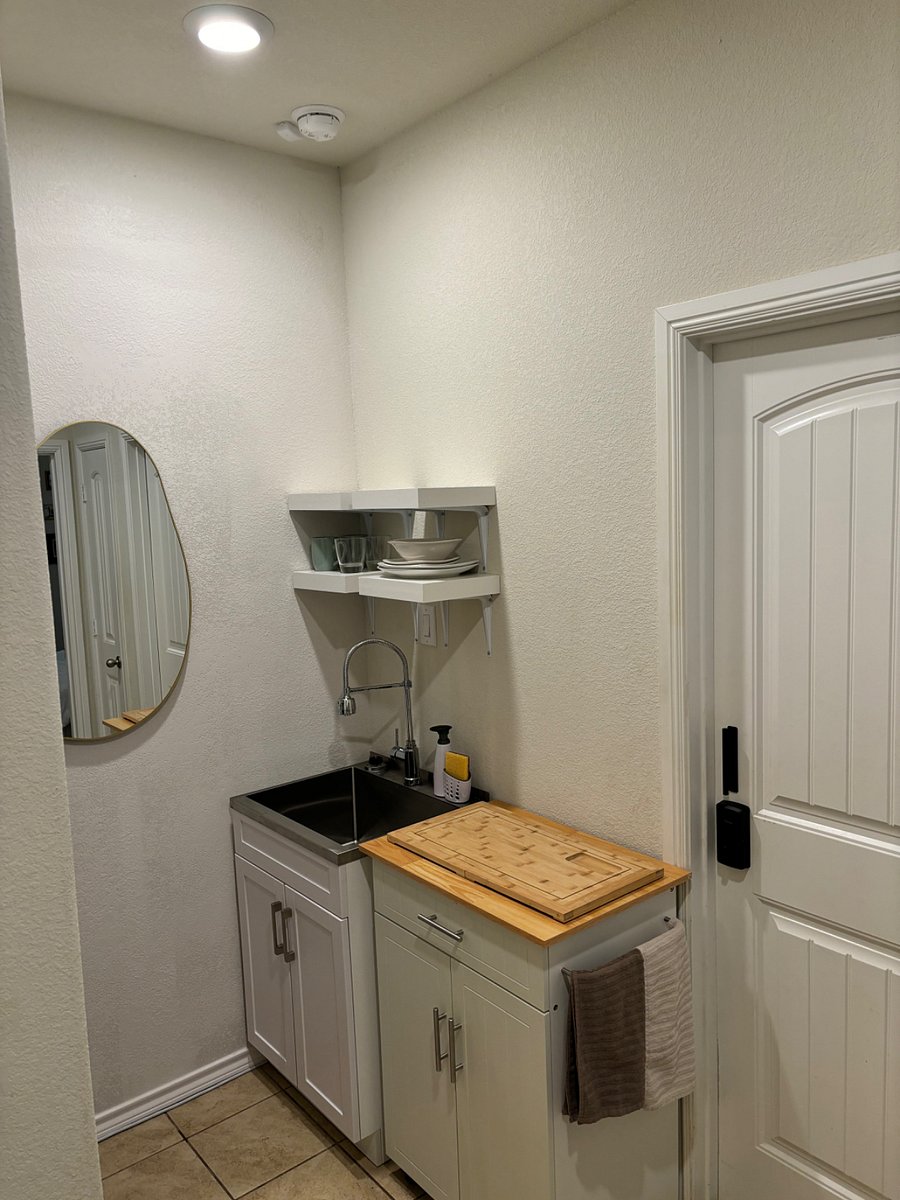 Kitchenette with stove top and other amenities to enjoy a nice meal