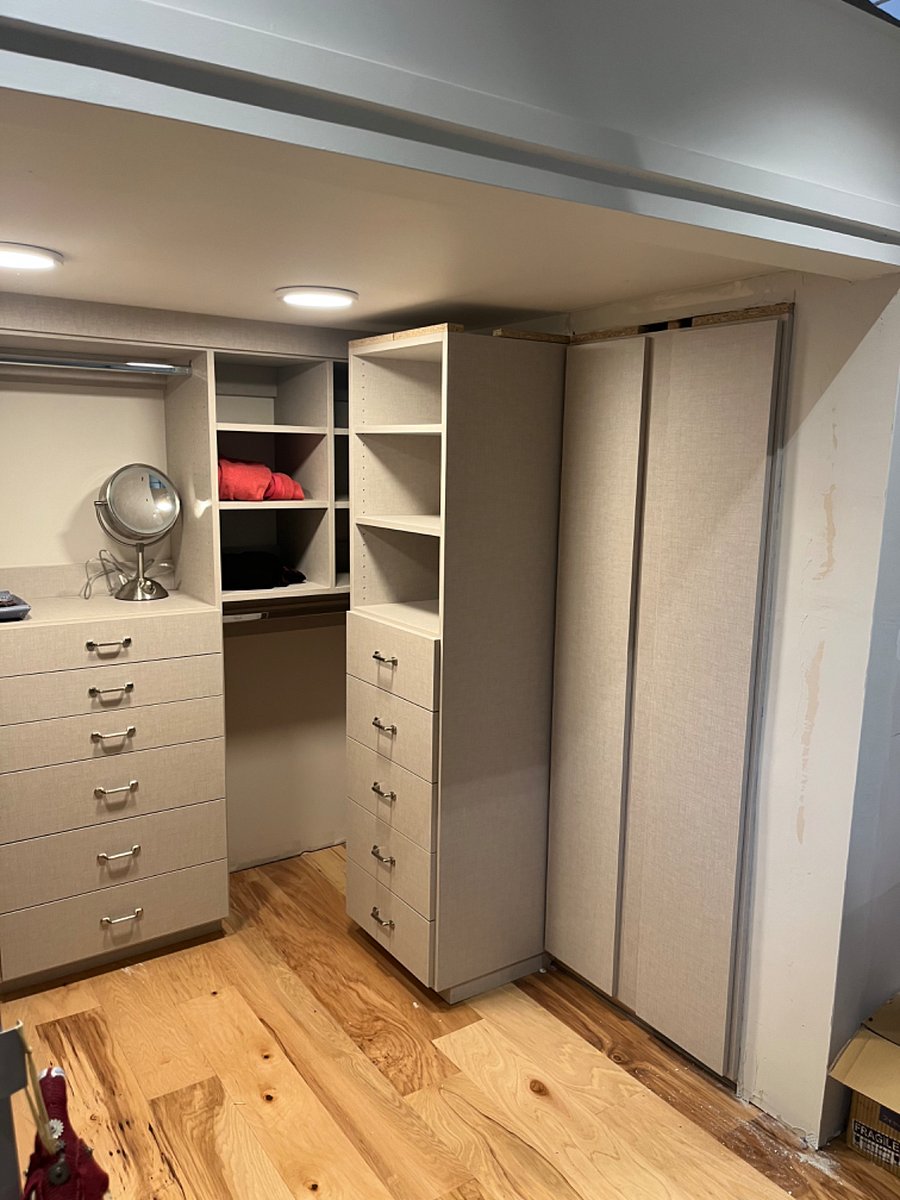 Walk-in closet underneath loft bed