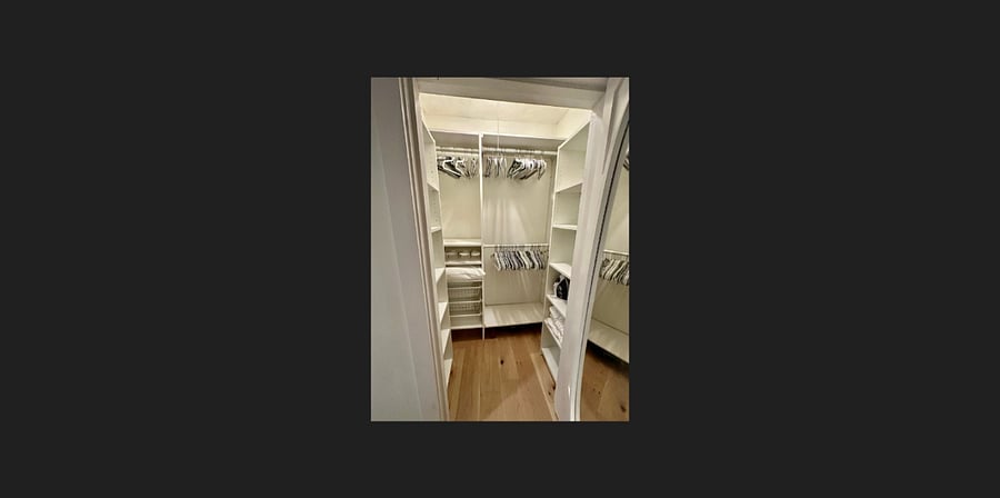 closet includes full length mirror, vacuum, ironing board and iron. Lots of storage space!