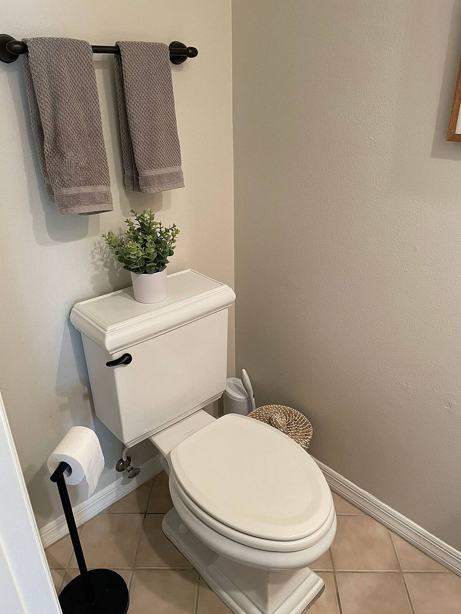 1/2 bath located downstairs across from the kitchen