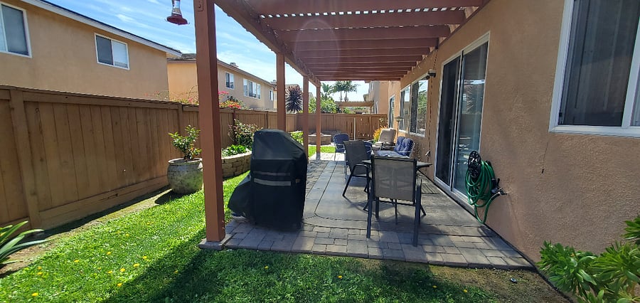 Gas grill in back yard