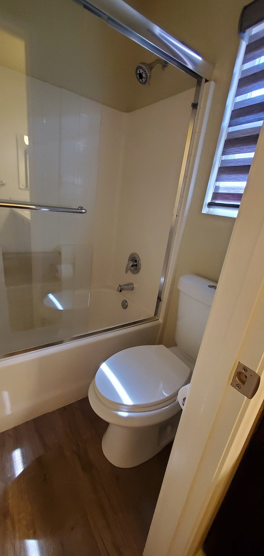 Bathroom includes tub and shower