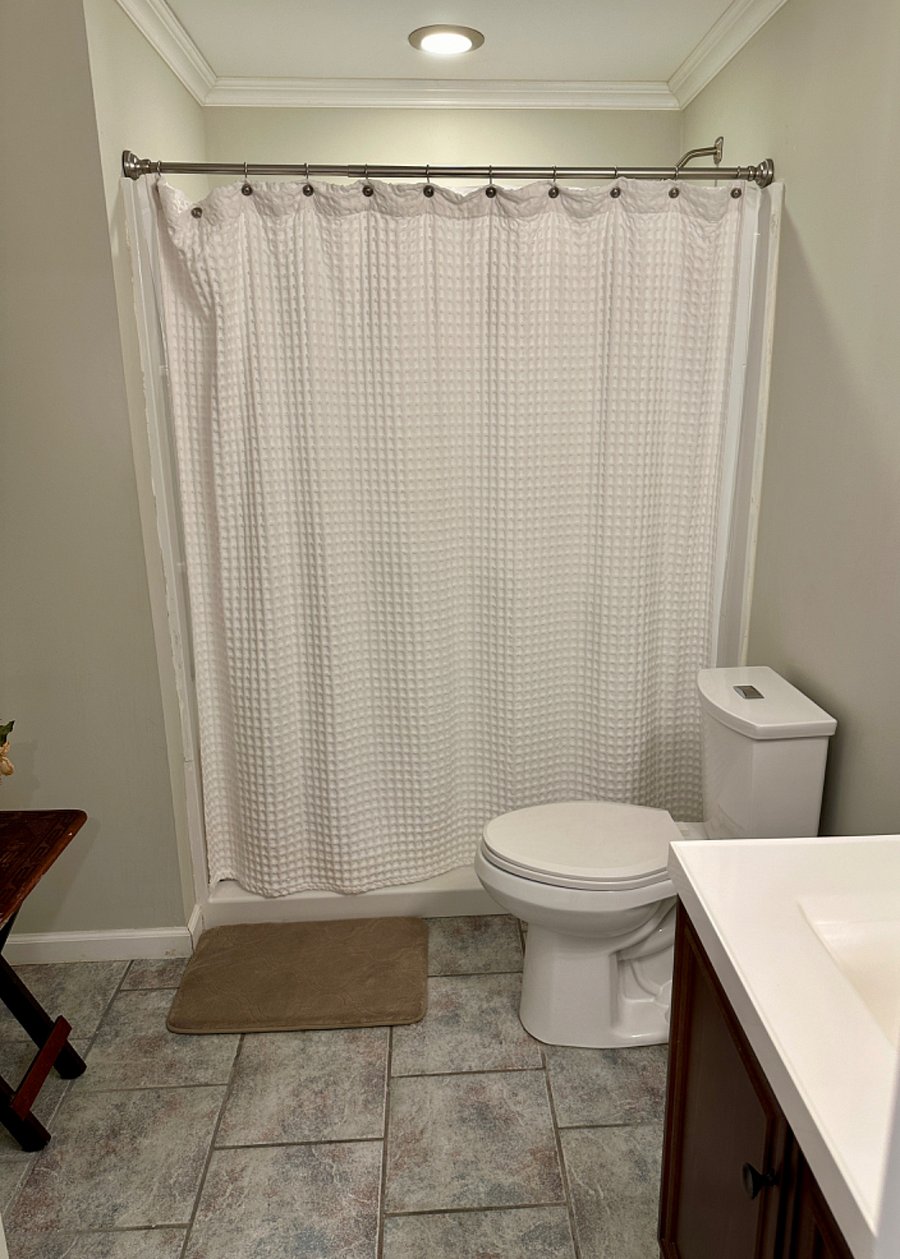 Full bathroom with linen closet