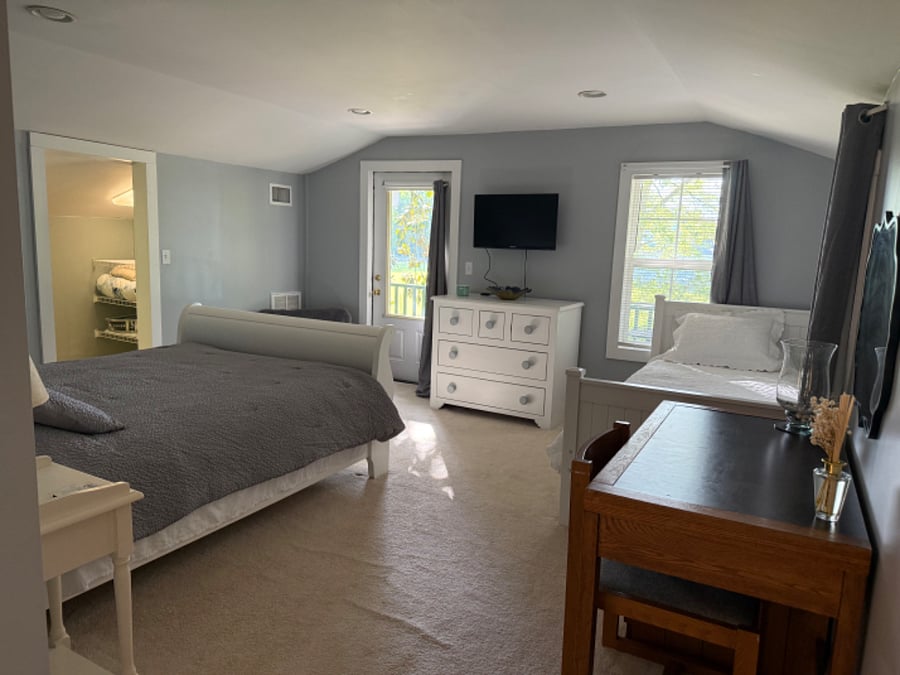Bedroom 2 Upstairs
Queen Bed
Nightstand
Twin Bed
Dresser
TV
Entrance to puzzle & game nook
Desk & Chair