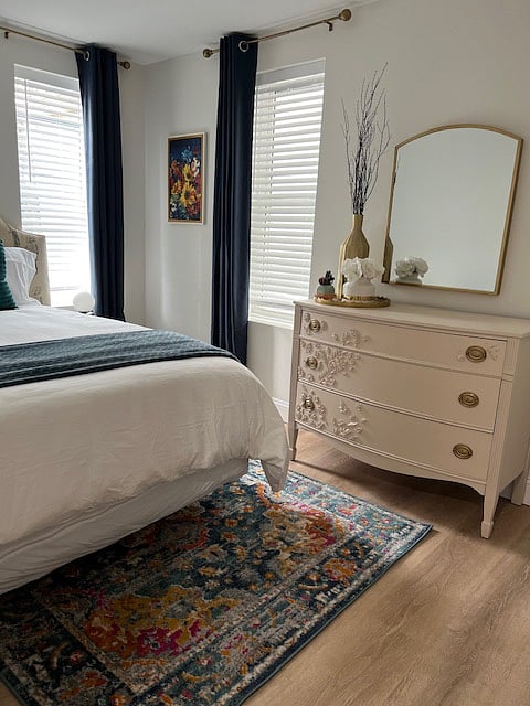 First bedroom on second floor with queen size bed, closet, plush blanket available and luggage stands available
