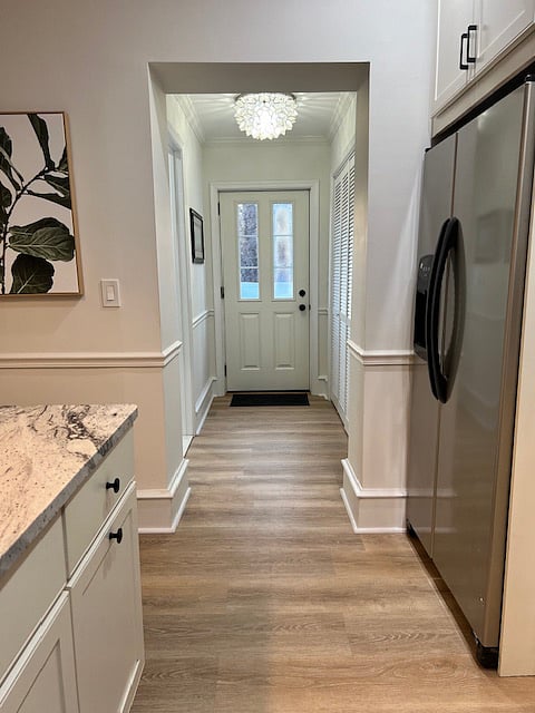 Back door to enclosed patio and yard.  BBQ available.  