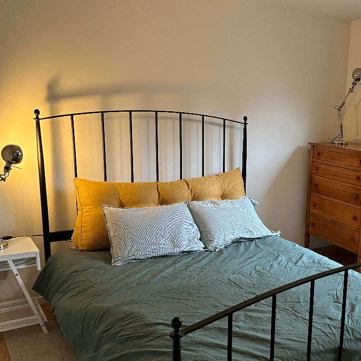 West facing BR with dresser & standard closet. Queen bed, across from primary bathroom.