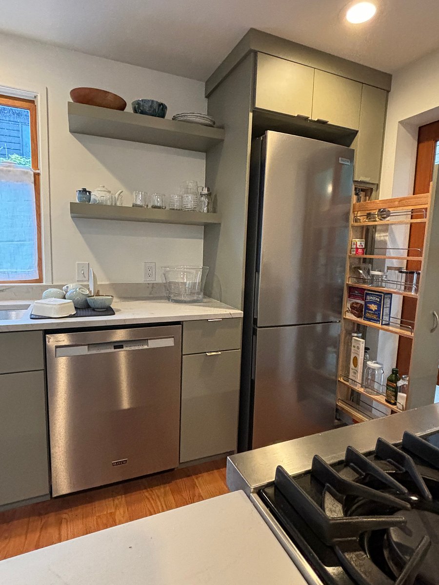 Kitchen, new fridge, pull out pantry, custom cabinets.