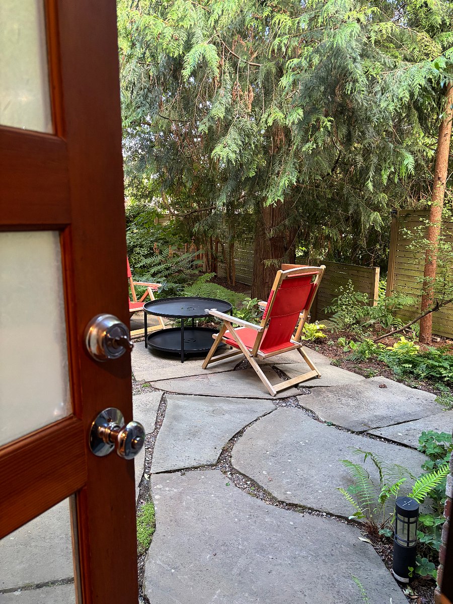 Rear shaded patio access from kitchen.