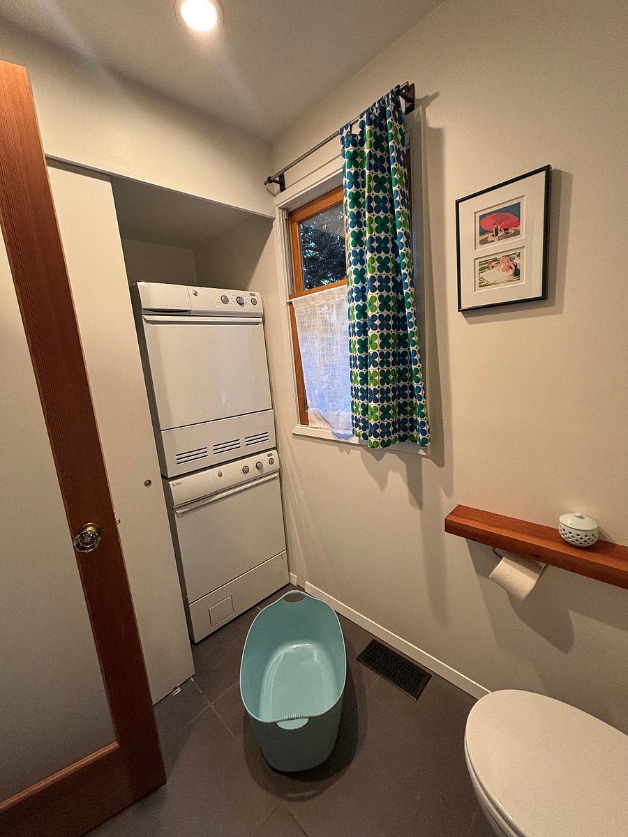 Half bath, first floor. Stacked W/D.