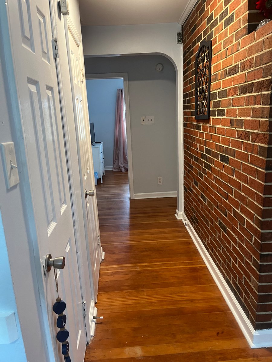 Beautiful antique Hart Pine floors are an original flare that makes this Bungalow cozy