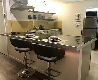 Kitchen with new garbage disposal, new Whirlpool dishwasher, microwave and refrigerator