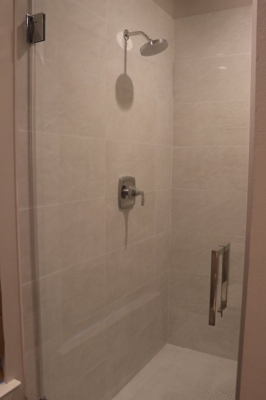 King Suite walk-in shower with built in seating.